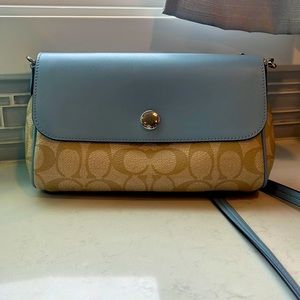 Small crossover coach purse. Reversible